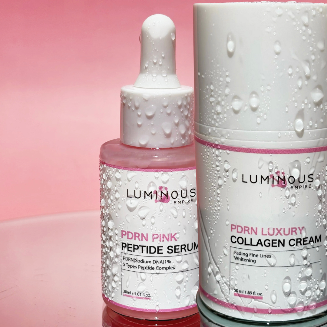 Luminous skincare products on a pink background